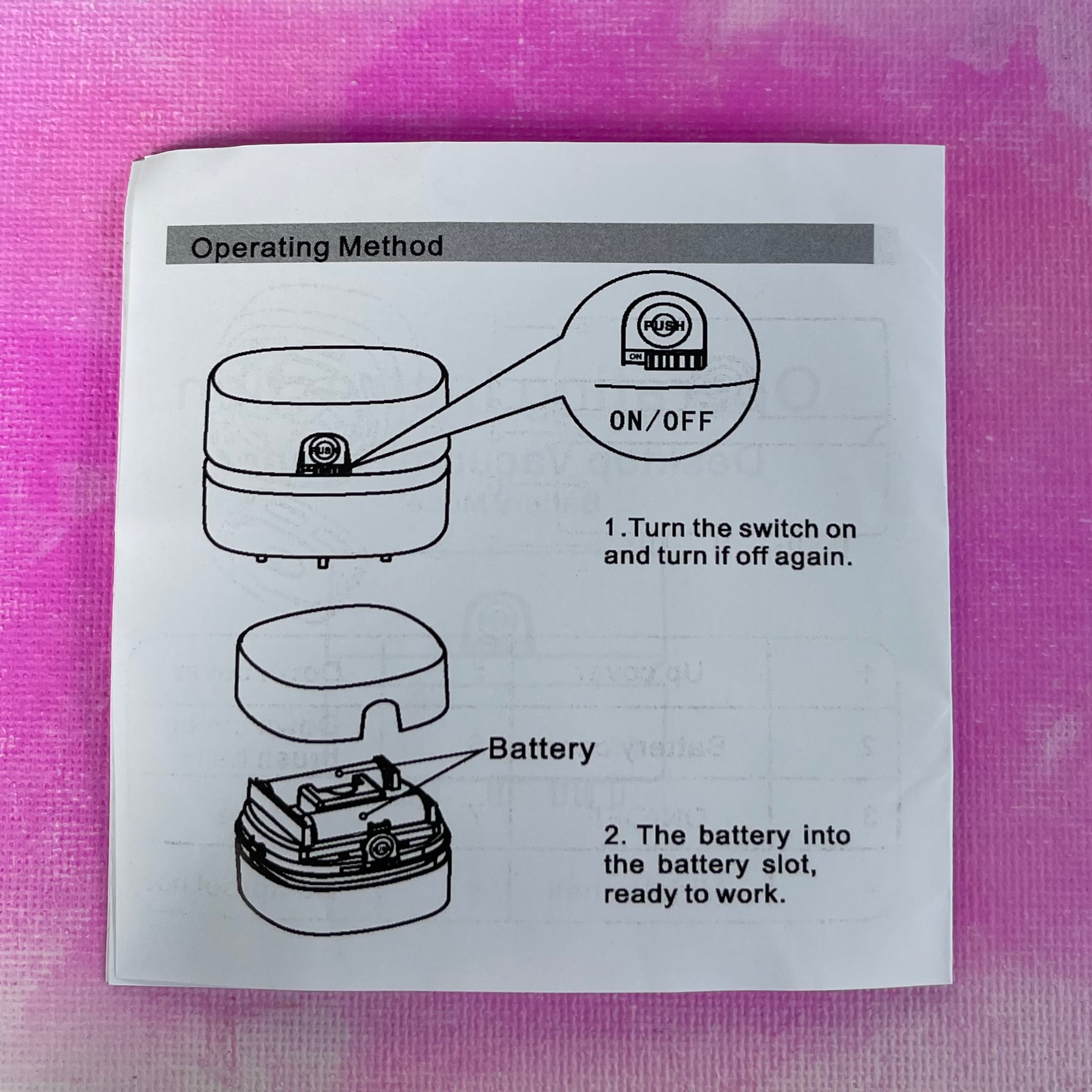 Instruction sheet showing mini desk vacuum with on/off switch and battery compartment details.