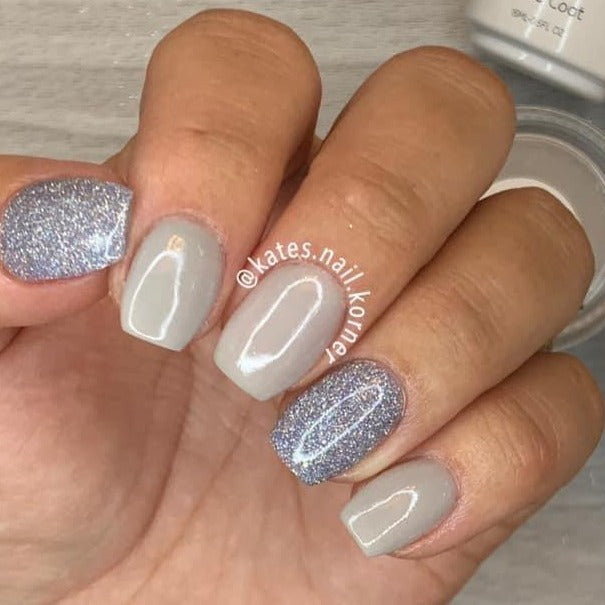 Short gray nails with silver holographic glitter accent nails on index and ring fingers.
