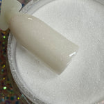 Fine white shimmer dip powder with subtle glitter, smooth texture, labeled DP59 Moonlight.