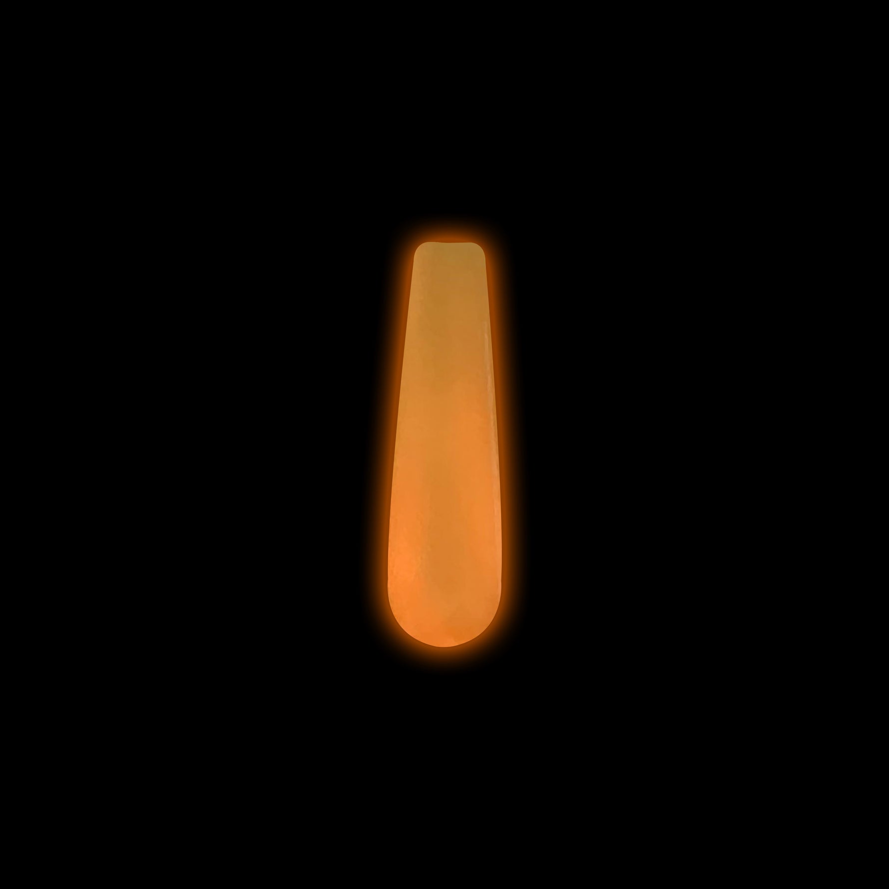 Bright neon orange dip powder nail swatch glowing vividly in the dark.