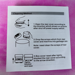 Instruction sheet showing steps to open, clean, and reset a mini desk vacuum's rear cover with simple line drawings on white .